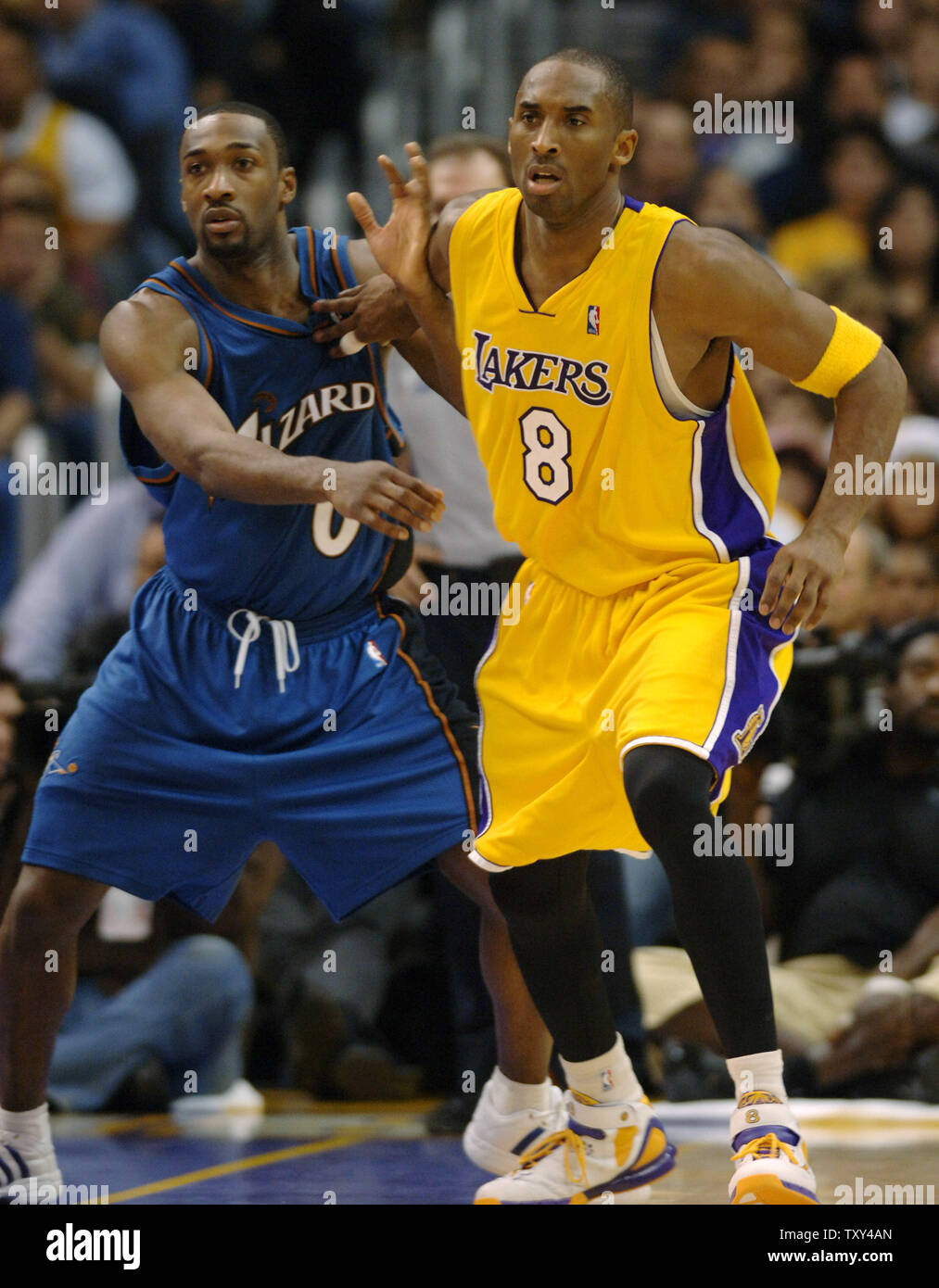 Los Angeles Lakers guard Kobe Bryant (R) and Washingtron Wizzards guard Gilbert Arenasfight for position during first quarter quarter NBA action at Staples Center in Los Angeles December 16, 2005. The Lakers defeated the Wizzards 97-91. (UPI Photo/Jim Ruymen) Stock Photo