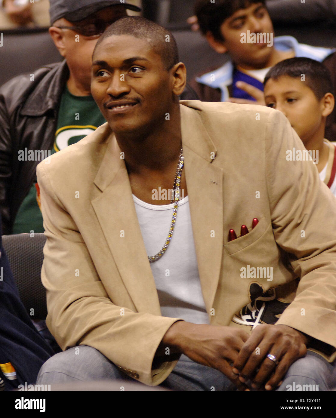 Indiana Pacers' Ron Artest watches the Los Angeles Lakers' NBA basketball game against the Cleveland Cavaliers in Los Angeles on January 12, 2006.  Artest, the 2003-04 NBA defensive player of the year, was averaging 19.4 points when he voiced his desire to be traded last month. He later recanted that statement, but team president Larry Bird and Walsh have said they are no longer interested in having him play for Indiana. Artest hasn't played in a game since Dec. 6.  (UPI Photo/Jim Ruymen) Stock Photo
