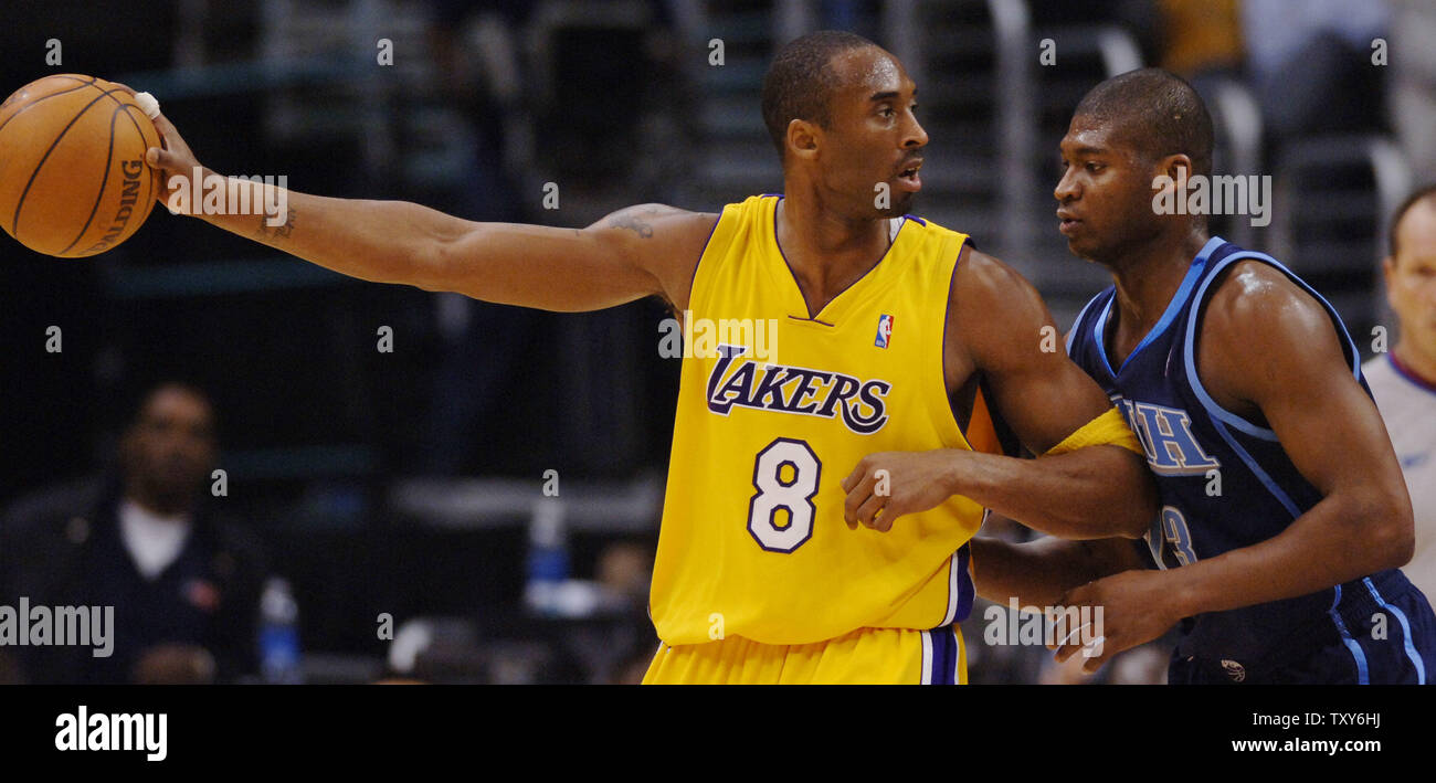 Los Angeles Lakers guard Kobe Bryant looks to pass over Utah Jazz's ...