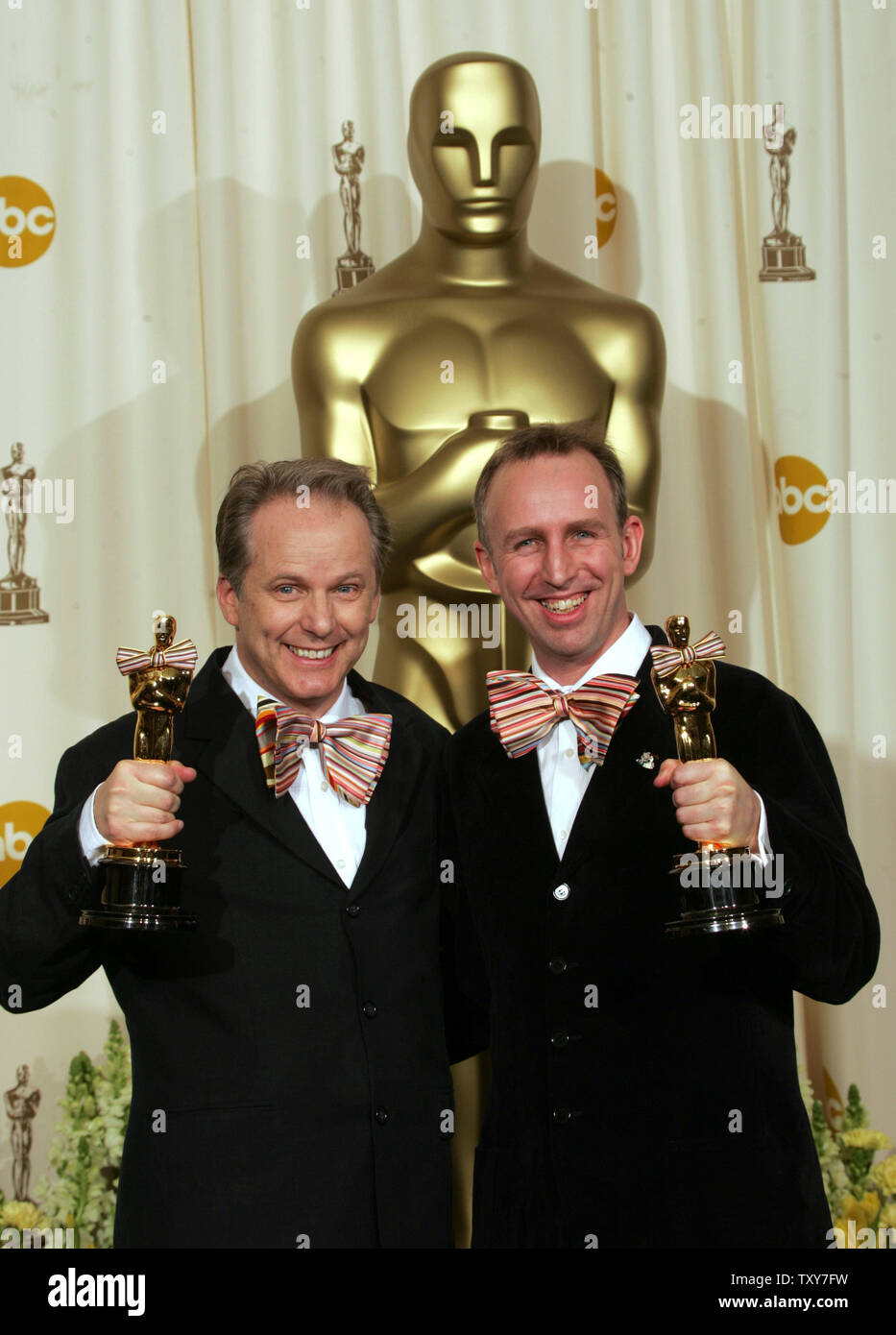 Nick Park and Steve Box show off their Oscars after winning for Best  Animated Feature for "Wallace and Gromit in the Curse of the Were-Rabbit"  at the 78th Annual Academy Awards at