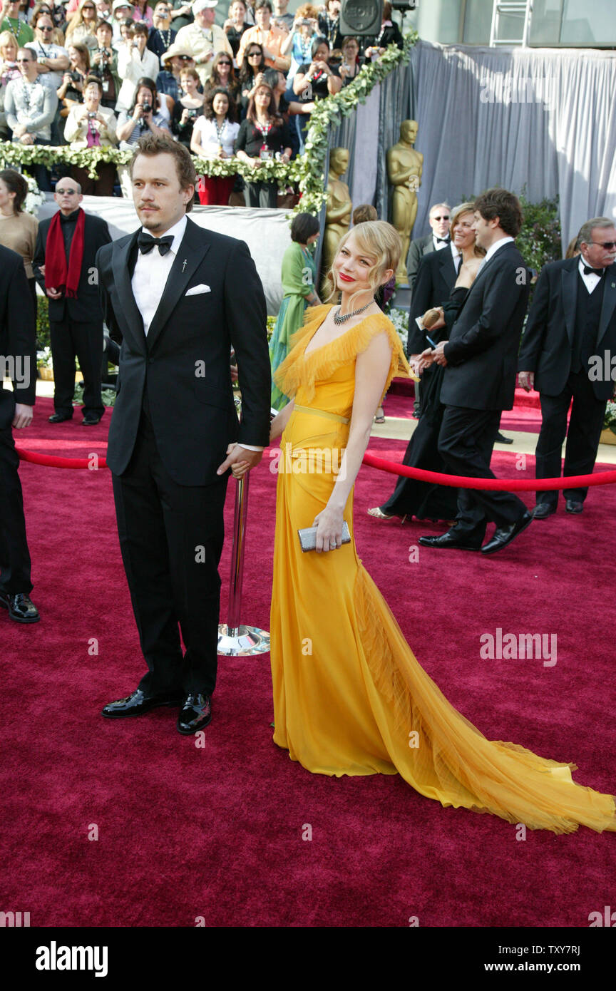 Heath Ledger , nominated for an Oscar for best actor in 'Brokeback Mountain,' and actress Michelle Williams , a nominee for best supporting actress for the same film, arrive for the 78th Annual Academy Awards at the Kodak Theatre in Hollywood, Ca., on March 5, 2006.   (UPI Photo/Terry Schmitt) Stock Photo