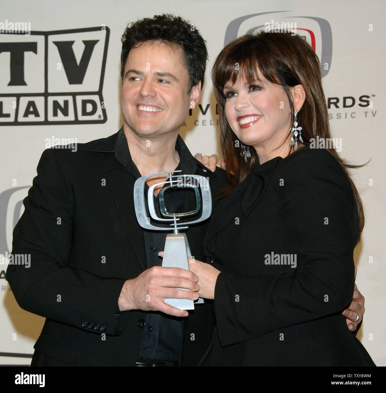 Marie Osmond (R) and her brother Donny Osmond appear backstage during a taping of the fourth annual TV Land Awards show on March 19, 2006 in Santa Monica, California. The Osmonds were honored with the favorite singing siblings award at the awards show which honors classic television performers and their shows and will be telecast on the TV Land cable channel on March 22. (UPI Photo/Jim Ruymen) Stock Photo
