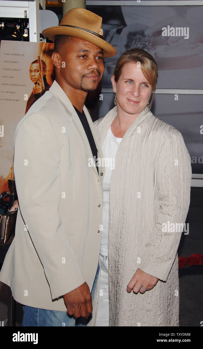 Cuba Gooding Jr. (R), who stars in the motion picture thriller 'Shadowboxer' arrives with his wife Sara for the premiere of the film at the Arclight Cinerama Dome in the Hollywood section of Los Angeles, California on July 19, 2006. (UPI Photo/Jim Ruymen) Stock Photo