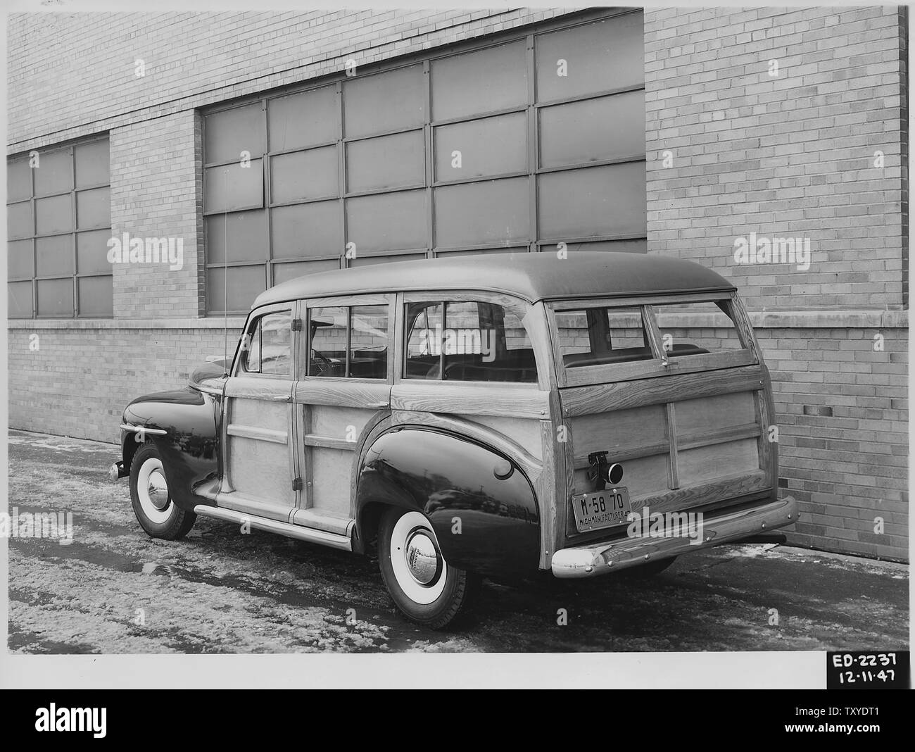 Chrysler, Dodge, Plymouth & DeSoto automobiles; Scope and content:  Photos of auto body designs. Some portray the actual automobiles, others are of drawings. General notes:  1947 Plymouth Special Deluxe Station Wagon Woody Stock Photo