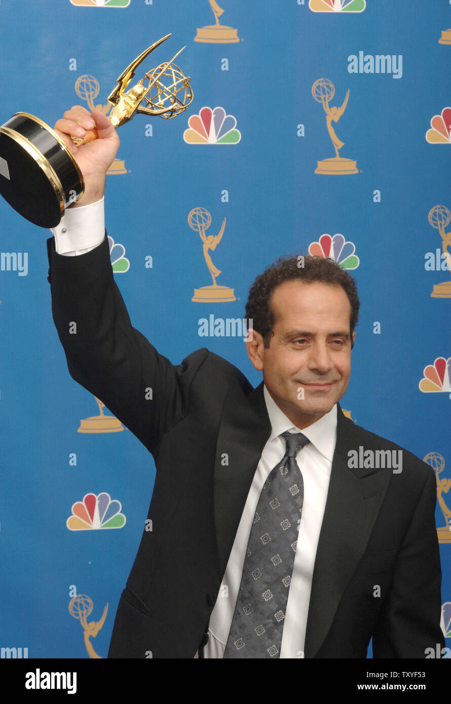 Tony Shalhoub holds his Emmy award for leading actor in a comedy series for 'Monk'  at the 58th annual Primetime Emmy awards at the Shrine Auditorium in Los Angeles, California on August 27, 2006. (UPI Photo/Jim Ruymen) Stock Photo
