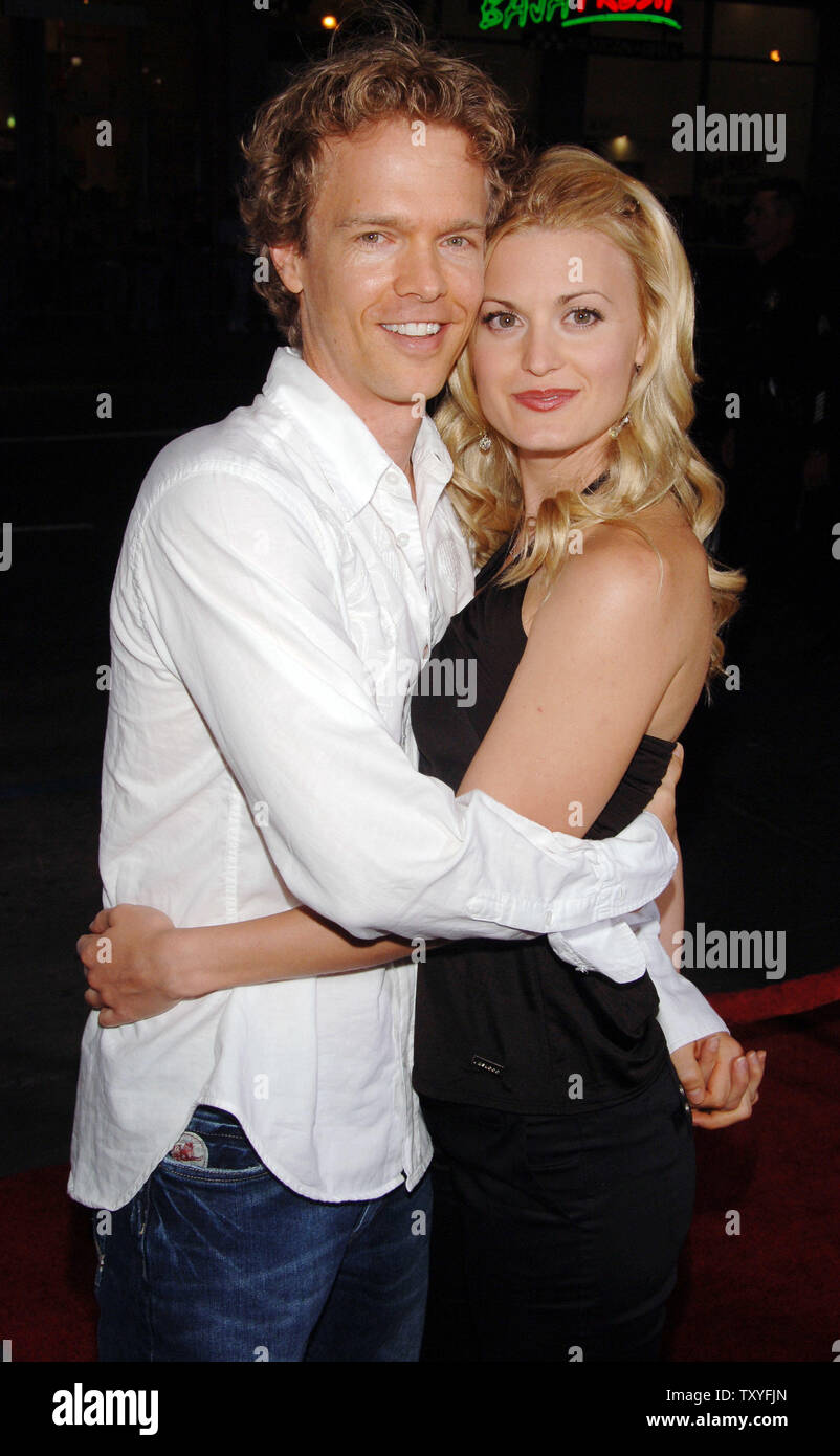Director Greg Coolidge and Brooke D'Orsay arrive for the premiere of