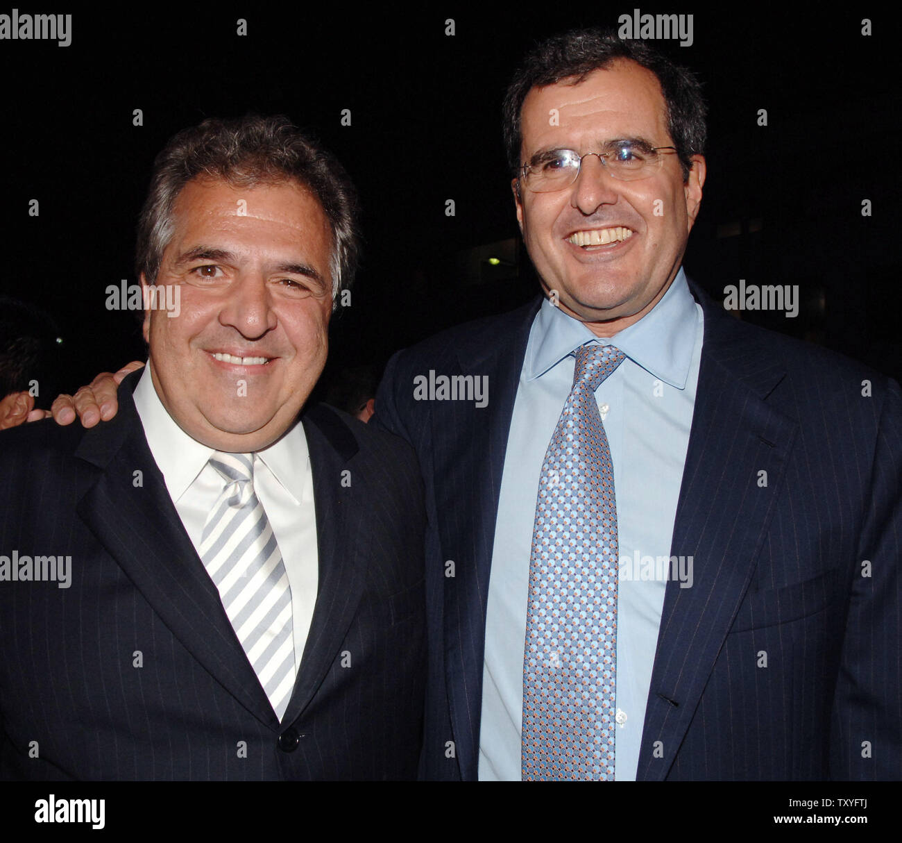 Peter Chernin (R), CEO of News Corporation and Jim Gianopulos, Chairman Fox Films Entertainment pose during the premiere of 'The Last King of Scotland' at the Academy of Motion Picture Arts & Sciences in Beverly Hills, California on September 21, 2006. The movie is based on the events of the brutal dictator Idi Amin's regime as seen by his personal physician during the 1970s. (UPI Photo/Jim Ruymen) Stock Photo
