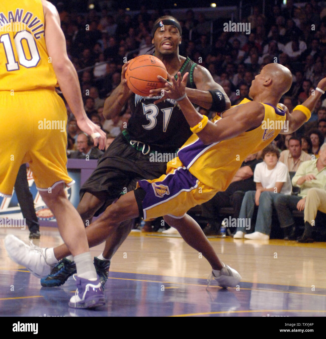 Los Angeles Lakers Maurice Evans Is Called For The Blocking Foul