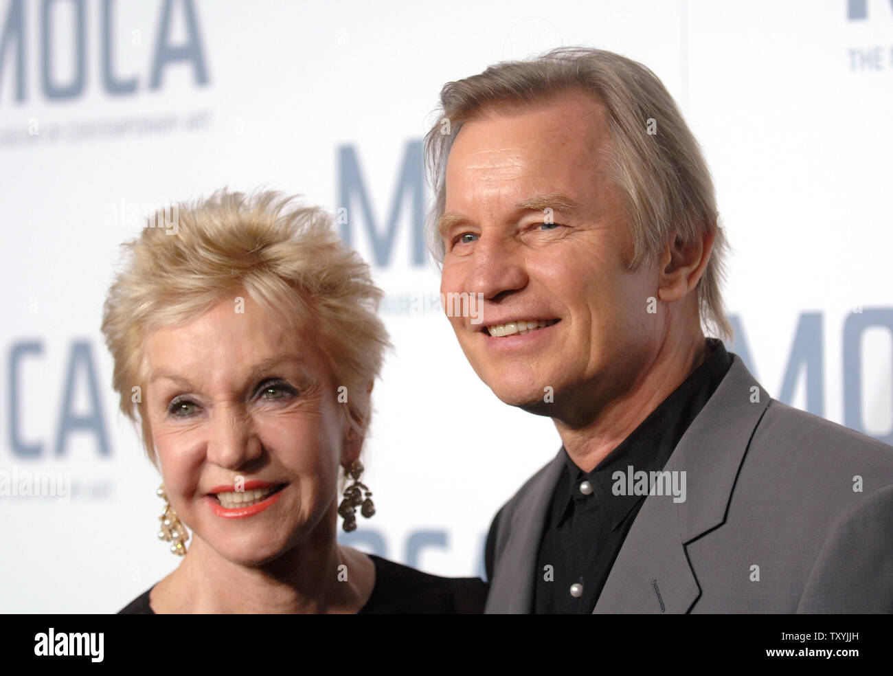 Actor Michael York (R) and wife Patricia McCallum attend the Skin + Bones: Parallel Practices in Fashion and Architecture opening night party at The Geffen Contemporary at MOCA in Los Angeles, California on November 18, 2006 . (UPI Photo/ Phil McCarten) Stock Photo