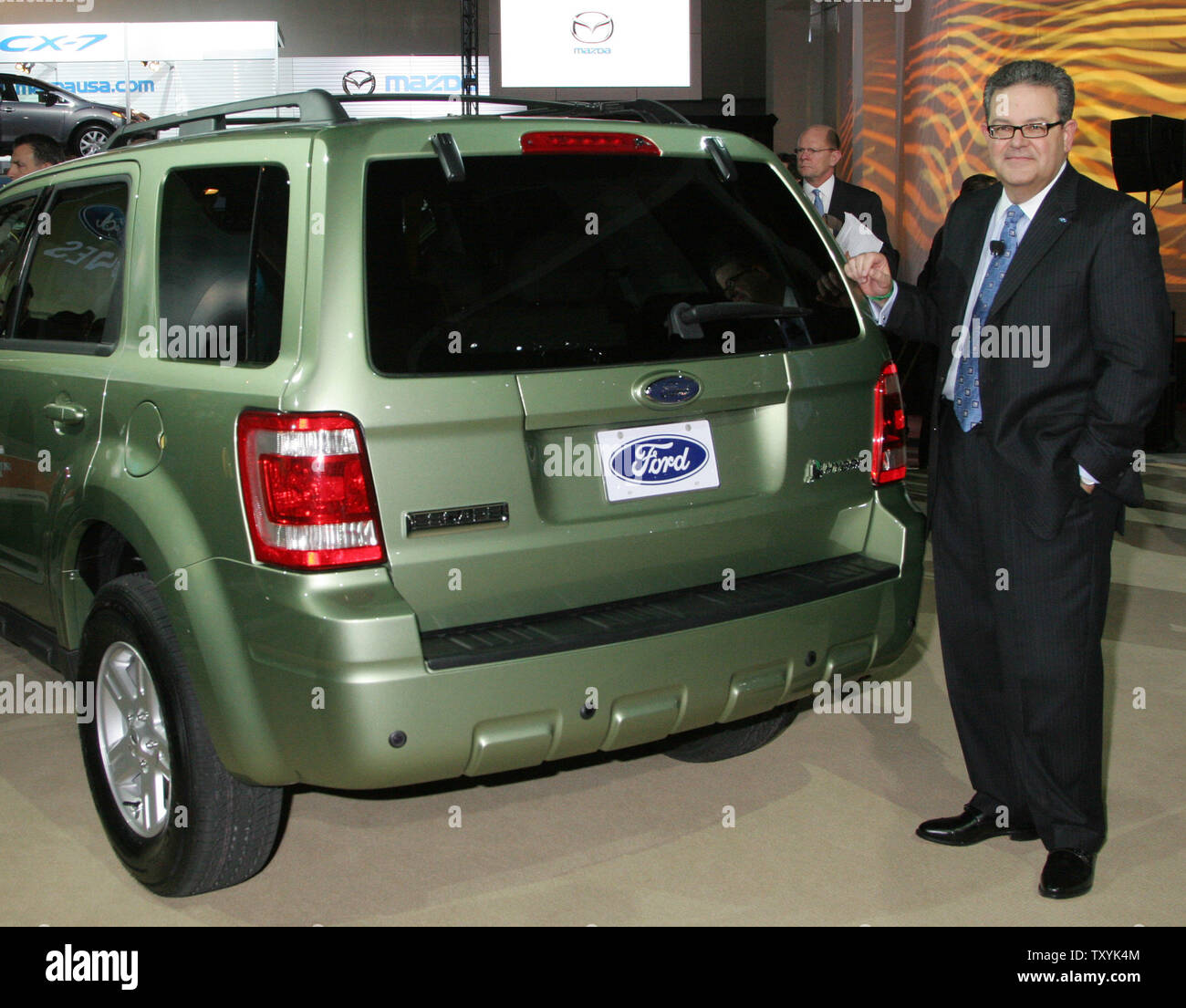 Patrick Riba Ford Ford Vice-President of Marketing Francisco Codina poses with the new ...