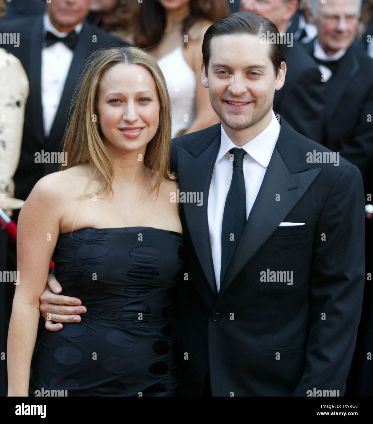 Toby Maguire and his girlfriend Jennifer Meyer arrive for the 79th