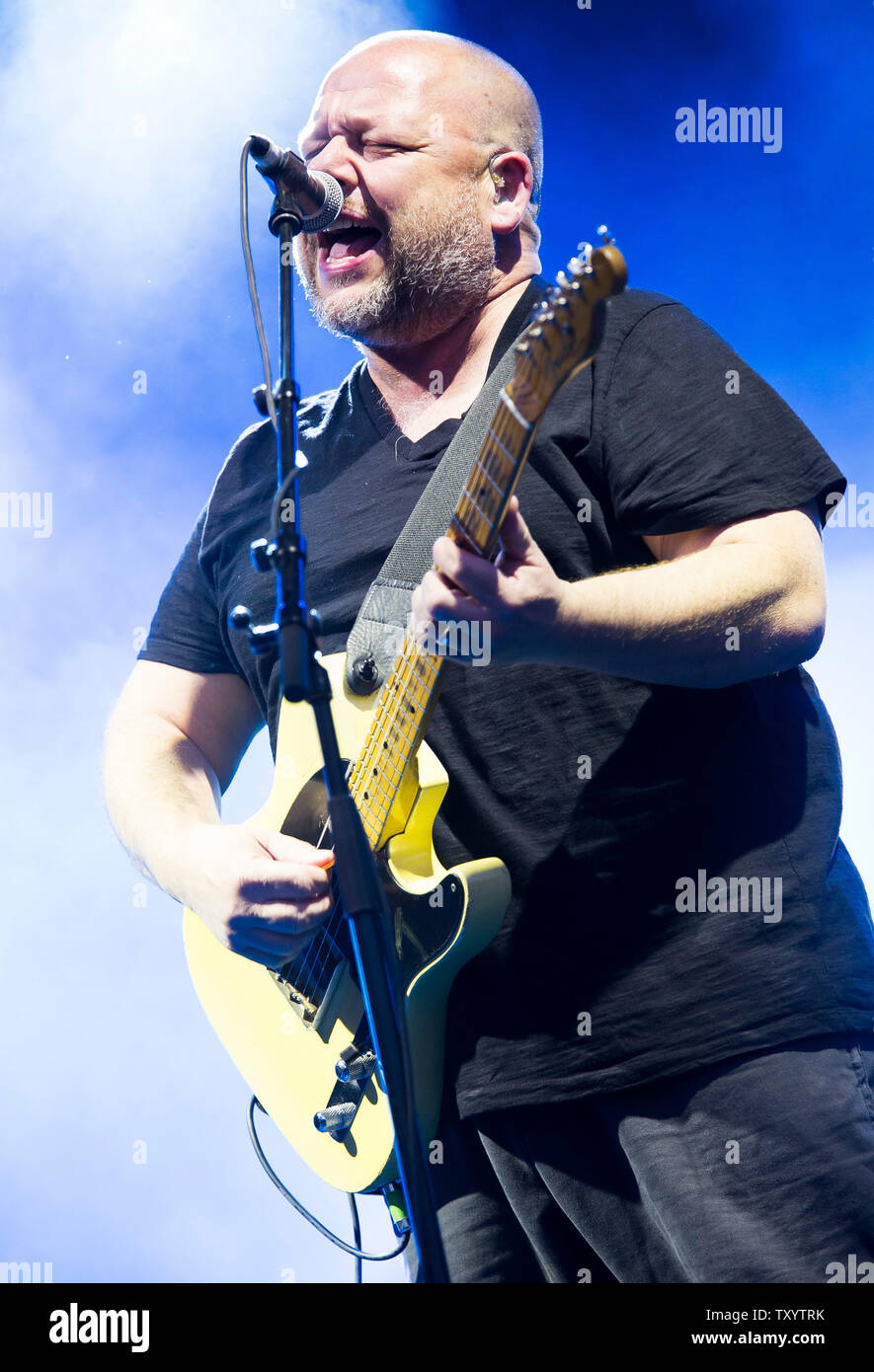 Black Francis, also known as Frank Black, performs with American grunge rock band The Pixies at Glastonbury Festival in 2014. Glastonbury Festival of Contemporary Performing Arts is the largest music festival in UK, attracting over 135,000 people each to Pilton, Somerset. Stock Photo