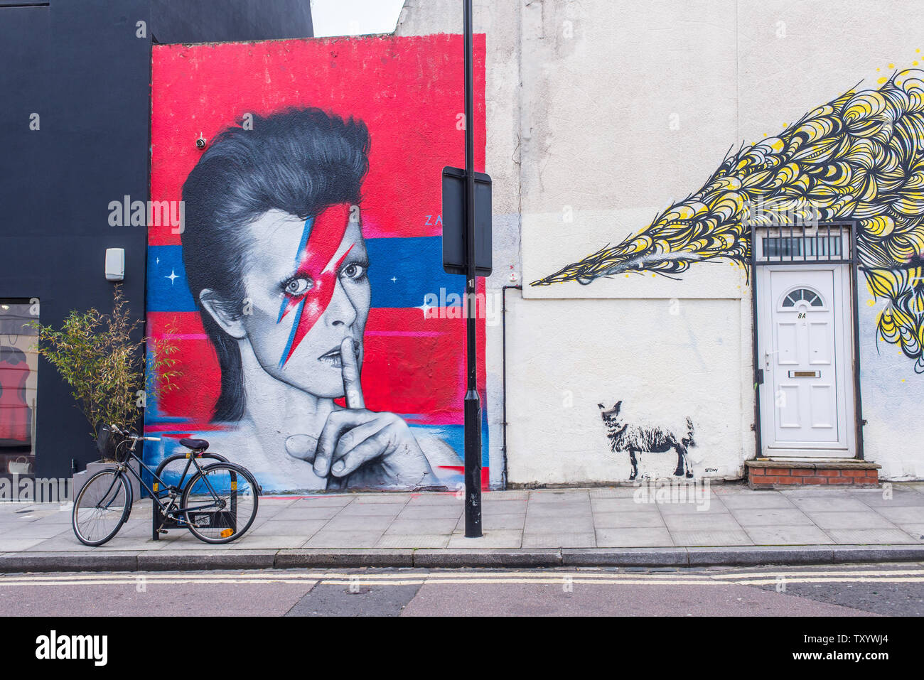 Mural street art graffiti representing David Bowie on a Ada street near Broadway Market, East London, England, UK Stock Photo