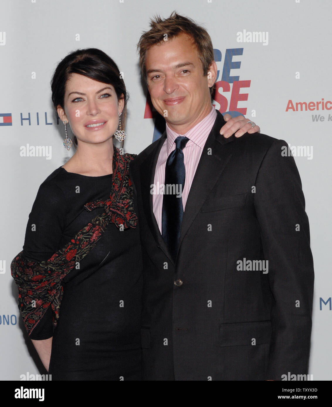 Actress Lara Flynn Boyle arrives with her husband, Texas businessman Donald Ray Thomas at the