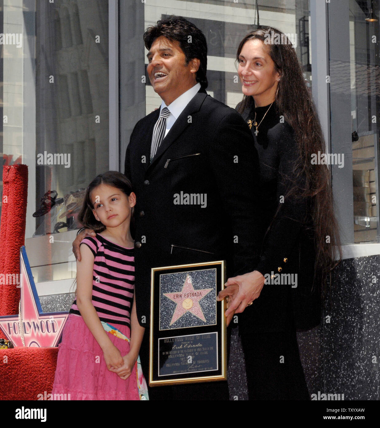 Actor Erik Estrada (R), best known for his role as Officer Frank 'Ponch' Poncherello in the 1977-1983 television series 'CHiPS' reacts with daughter Francesca and wife Nanette during ceremonies unveiling Estrada's star on the Hollywood Walk of Fame in Los Angeles on April 19, 2007. (UPI Photo/Jim Ruymen) Stock Photo
