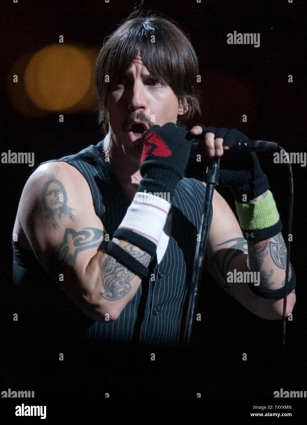Anthony Kiedis lead singer of The Red Hot Chili Peppers sings a song during  their set on the second day at the Cochella Music Festival in Indio,  California on April 28, 2007. (