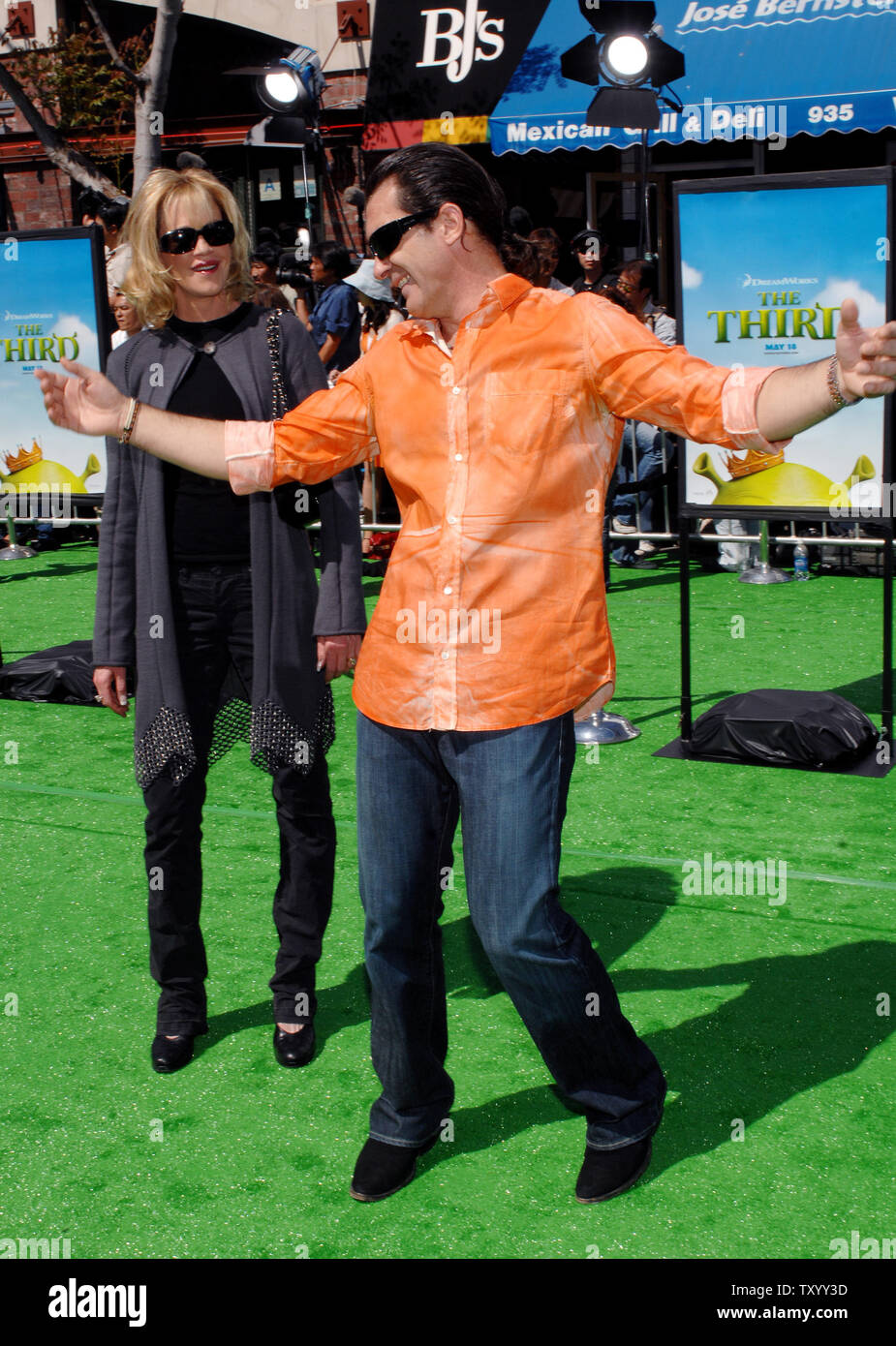 Actor Antonio Banderas, the voice of Puss in Boots in the animated motion picture 'Shrek the Third' arrives with his wife, actress Melanie Griffith for the premiere of the film in the Westwood section of Los Angeles on May 6, 2007. (UPI Photo/Jim Ruymen) Stock Photo