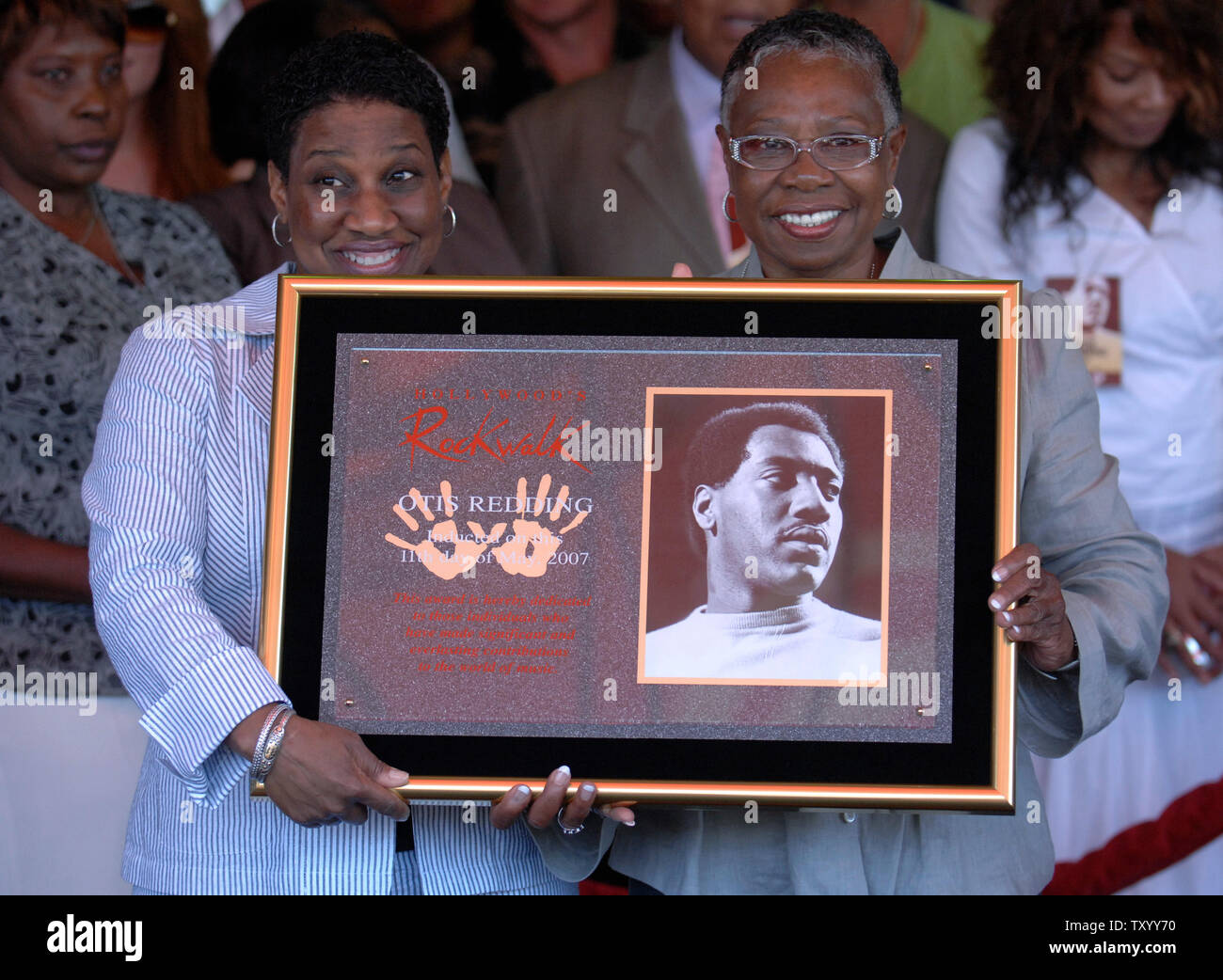 Otis Redding's wife Zelma Atwood (R) and daughter Carla Redding-Andrews (L) attend a ceremony where the late Otis Redding, The Mamas and the Papas, and Al Kooper are inducted into Hollywood's Rockwalk  in the Hollywood section of Los Angeles on May 11, 2007. (UPI Photo/ Phil McCarten) Stock Photo