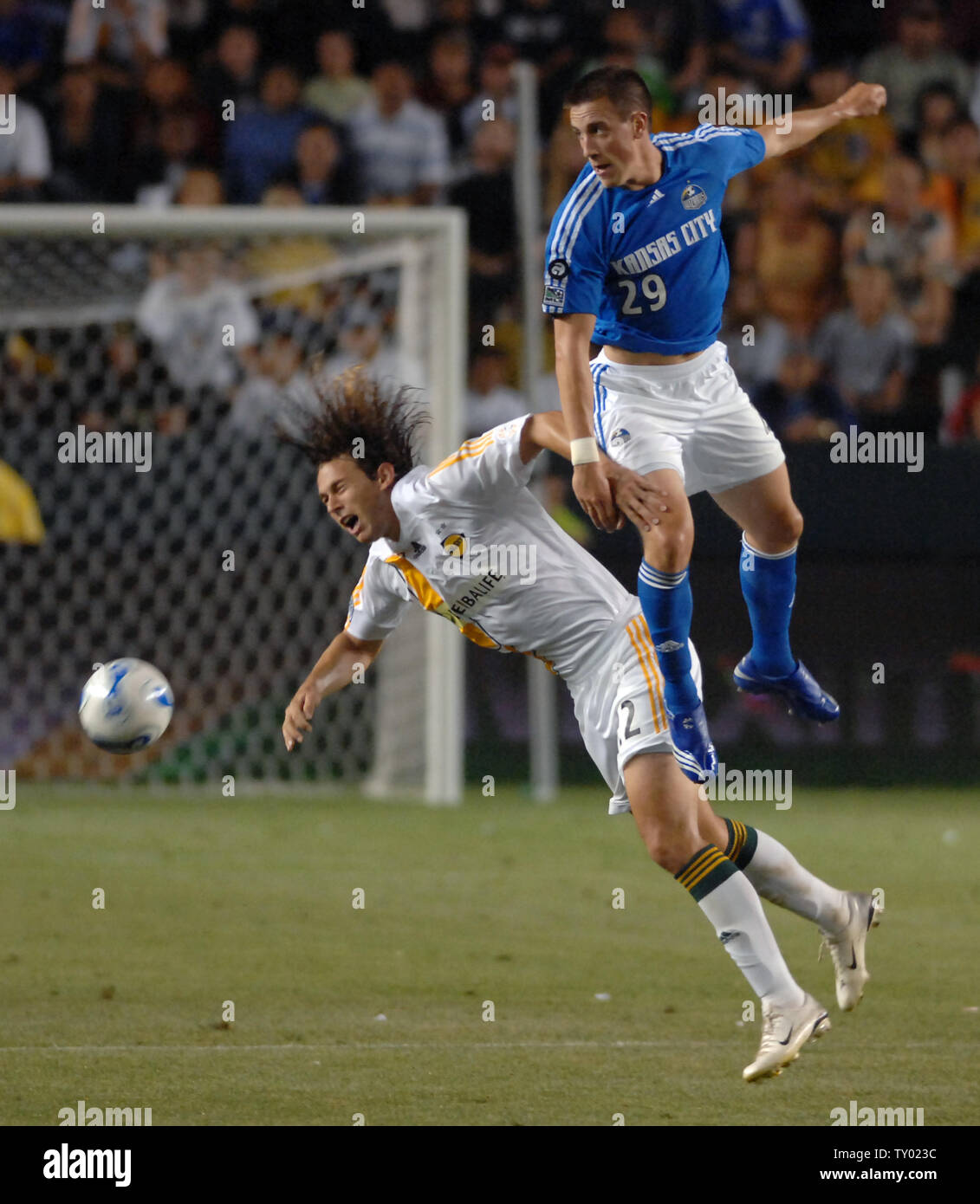 Los Angeles Galaxy S Kelly Gray L Directs The Ball Away From Kanasa City Wizards Ryan Pore During The Second Half Of An Mls Soccer Match In Carson California On July 7 07 Los Angeles Galaxy S Kelly Gray L Directs The Ball Away From Kanasa City Wizards Ryan Pore During The Second Half Of An Mls Soccer Match In Carson California On July 7 07