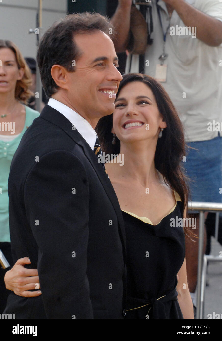 Cast member Jerry Seinfeld (L), who lends his voice to character Barry