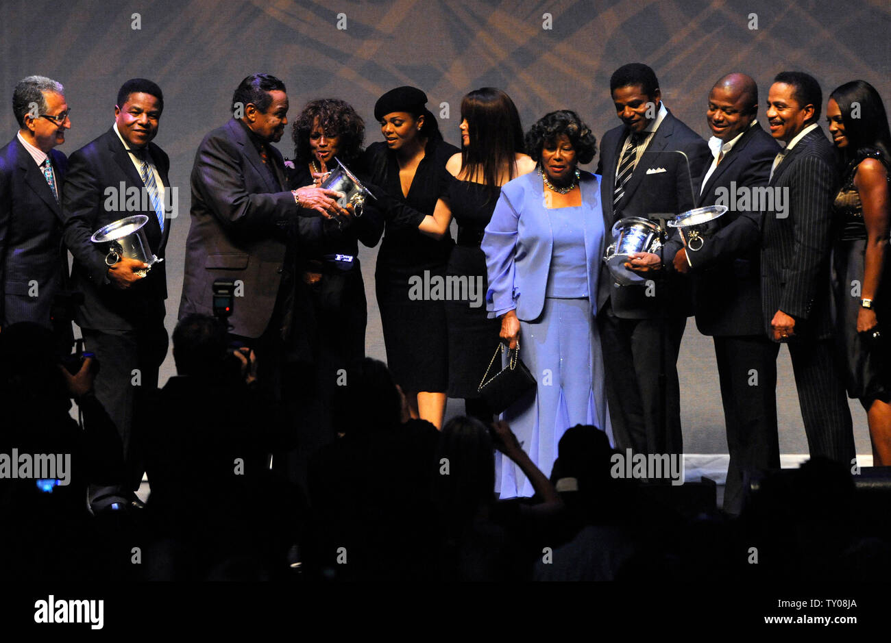 Members of the Jackson family come to the stage as the Jacksons are