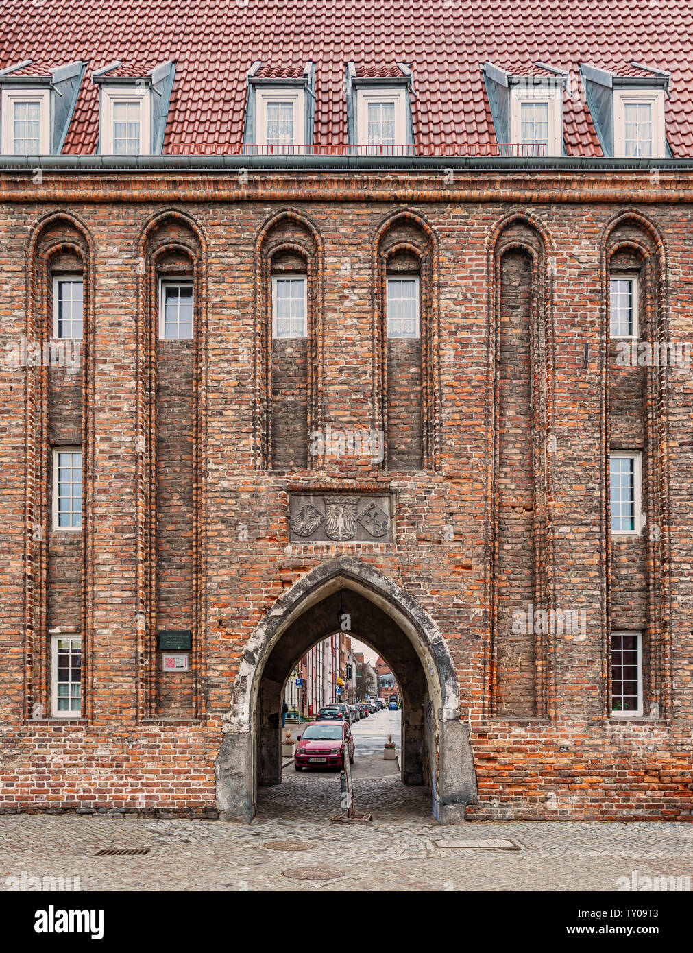 Gdansk, Poland – Feb 14, 2019: The Mariacka Gate building facade located at the promenade at Motlawa River in old town district of Gdansk, Poland. Stock Photo