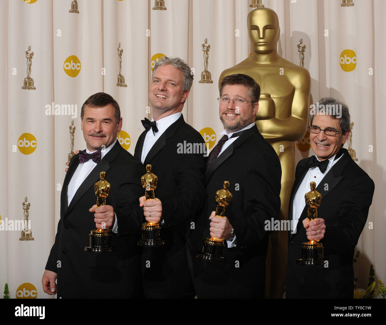 Michael Fink, Bill Westenhofer, Ben Morris, and Trevor Wood pose with their Oscar for Achievement in Visual Effects for 'The Golden Compass' at the 80th Annual Academy Awards at the Kodak Theatre in Hollywood, California on February 24, 2008.  (UPI Photo/Jim Ruymen) Stock Photo