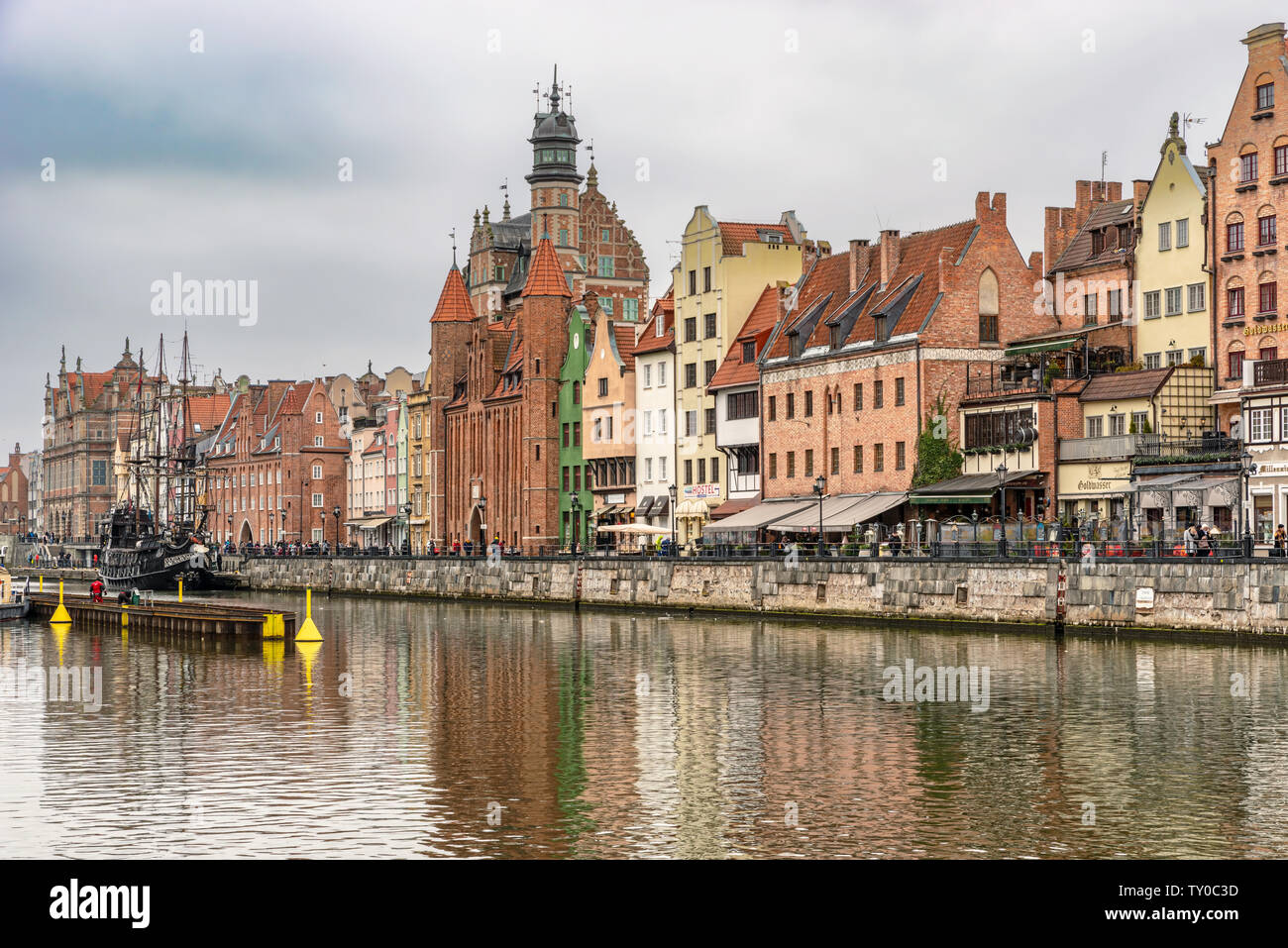 Gdansk, Poland – Feb 14, 2019: View at historic houses along Motlawa river in the old historic town of the Gdansk city in Poland. It is one of many to Stock Photo