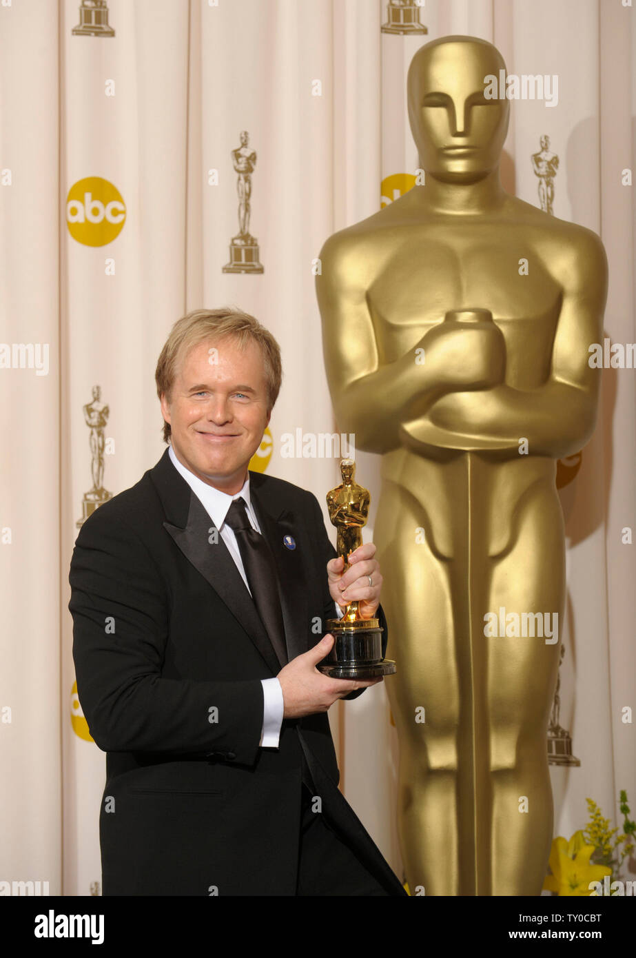 Brad Bird holds the Best Animated Feature Oscar he won for "Ratatouille