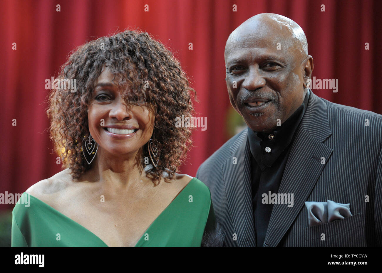 Lou Gossett, Jr. and his guest arrives for the 80th Annual Academy