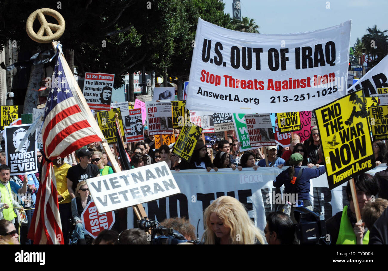 Anti-war demonstrators march through the streets of Hollywood in Los ...