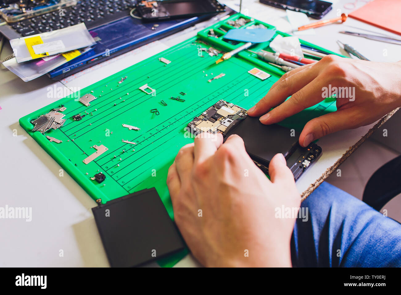 Cell phone repair. Smartphone parts and tools for recovery, selective