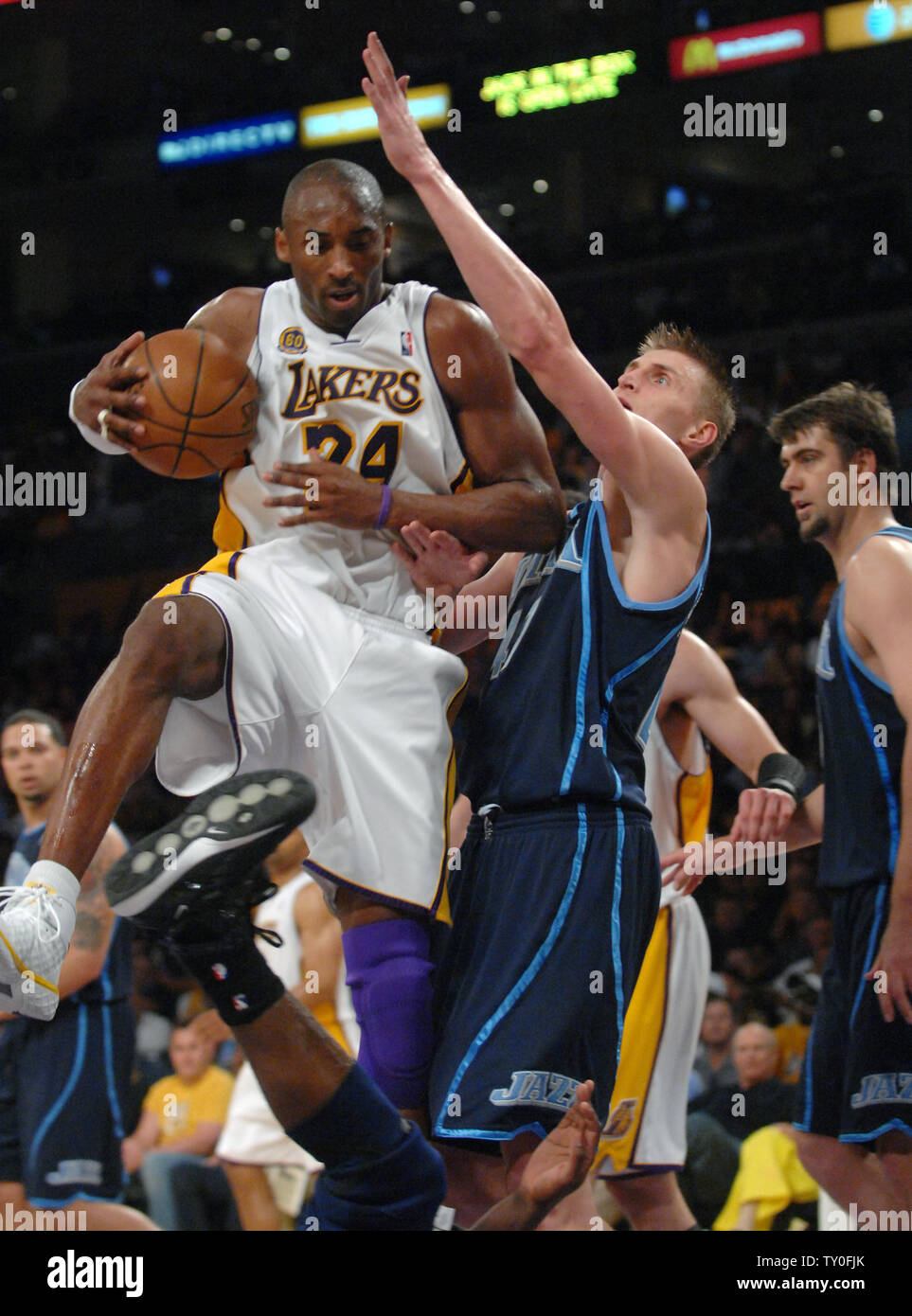 Utah Jazz forward Andrei Kirilenko, of Russia, stops Los Angeles Lakers  guard Kobe Bryant, left, during the fourth quarter Wednesday, Dec. 4, 2002,  in Salt Lake City. The Jazz won 93-85. (AP