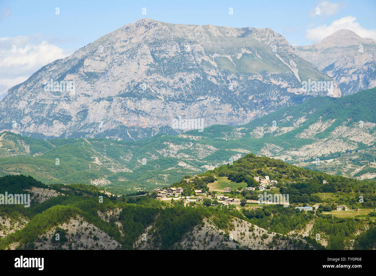 Landscape view of the town of Belsierre with Punta Llerga peak in the background from Vió valley (Laspuña, Sobrarbe, Huesca, Pyrenees, Aragon, Spain) Stock Photo