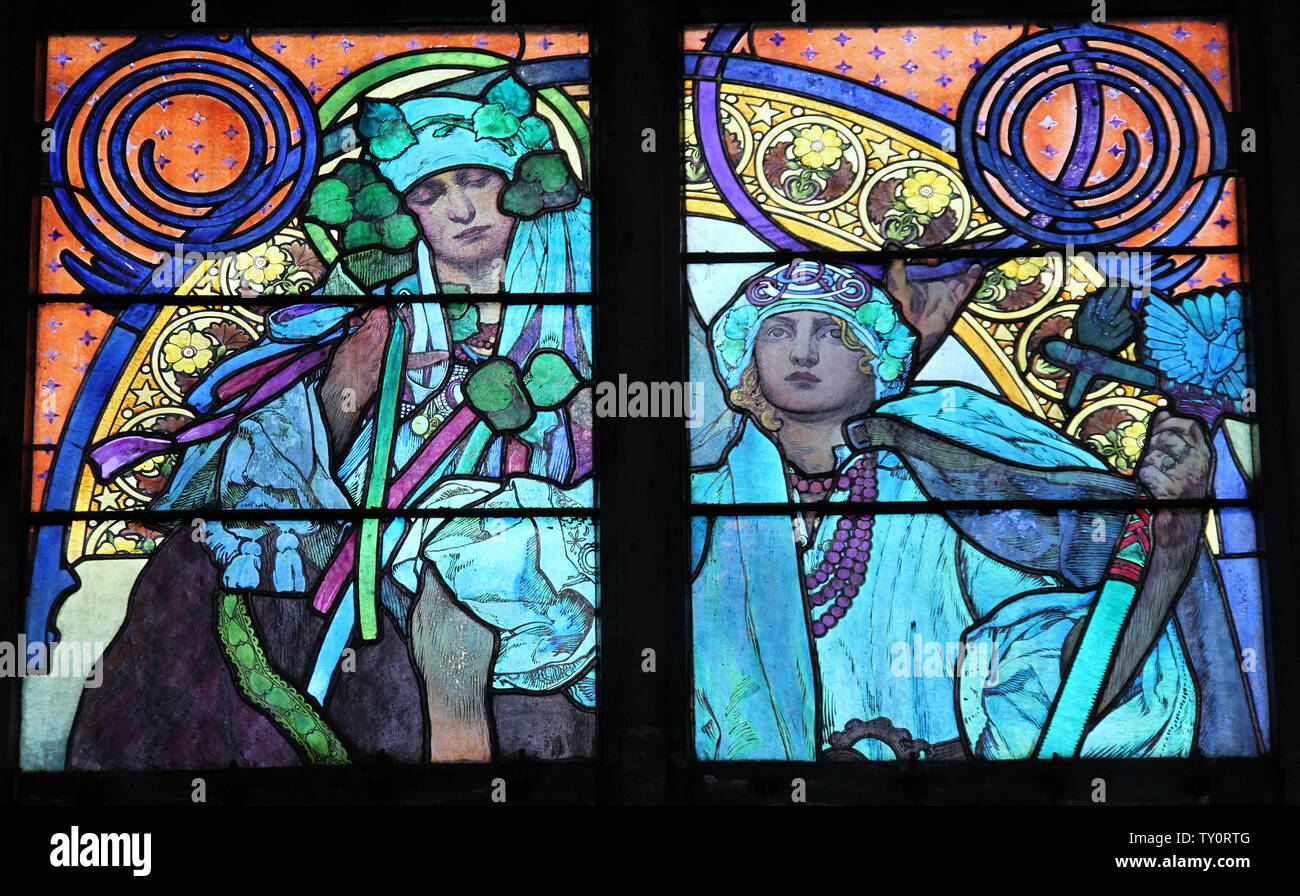 Detail of the famous art nouveau style window in Prague Cathedral by Alphonse Mucha Stock Photo