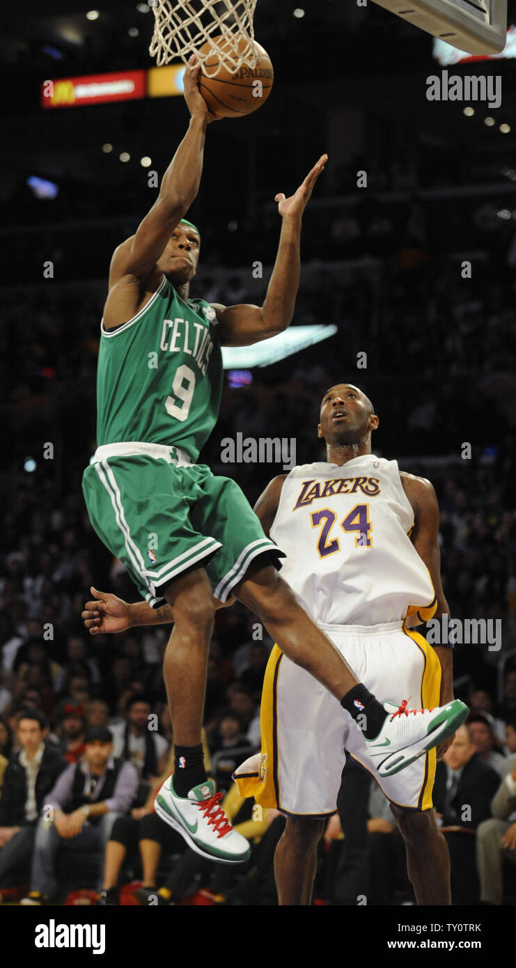Kobe Rondo Los Angeles Lakers' Kobe Bryant (R) defends as Boston Celtics' Rajon ...