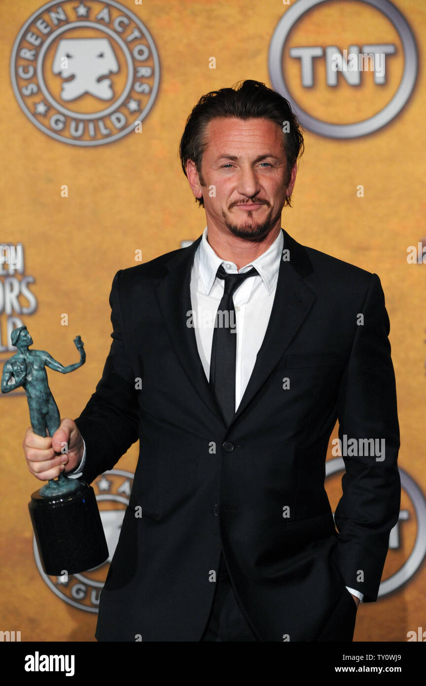 Sean Penn appears backstage with this award for outstanding performance