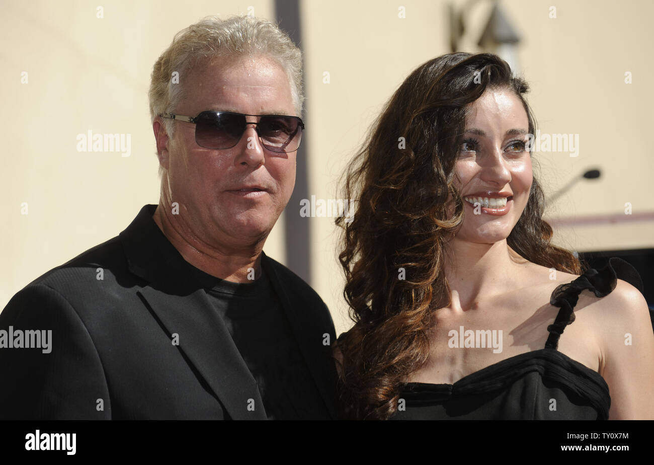 William Petersen (L) and wife Gina Cirone pose for photographers at a ceremony where the actor receives a star on the Hollywood Walk of Fame in Los Angeles on February 3, 2009. (UPI Photo/ Phil McCarten) Stock Photo