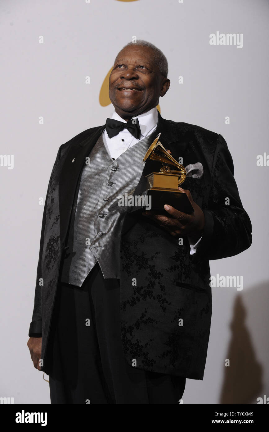 B B King Holds His Grammy Award For One Kind Favor At The 51st b-b-king-holds-his-grammy-award-for-one-kind-favor-at-the-51st