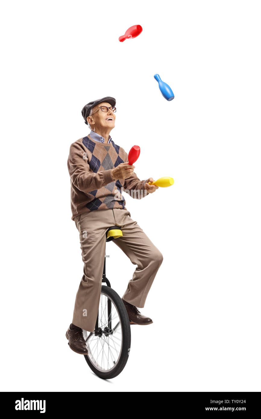 Juggling on a unicycle hires stock photography and images Alamy