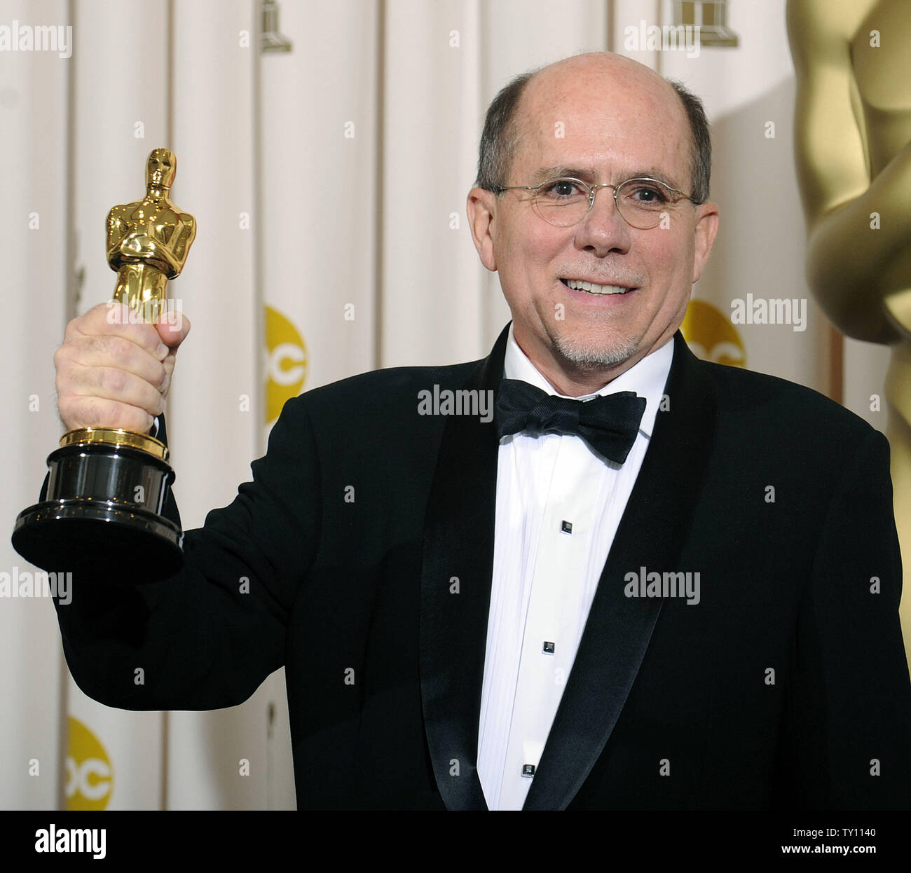 Richard King holds his Oscar for achievement in sound editing for the