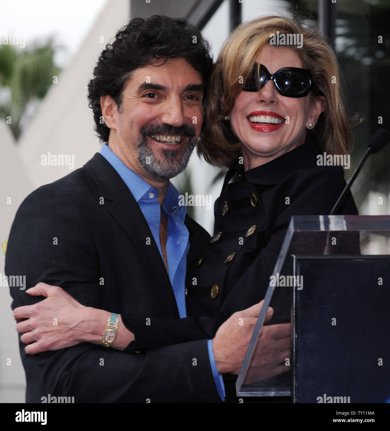 Chuck Lorre (L) is embraced by actress Christine Baranski during ceremonies honoring him with the 2,380th star on the Hollywood Walk of Fame in Los Angeles on March 12, 2009. Lorre produces and co-created CBS' 'The Big Bang Theory' and 'Two and Half Men'. He also produced 'Dharma & Greg'' and 'Grace Under Fire'. (UPI Photo/Jim Ruymen) Stock Photo