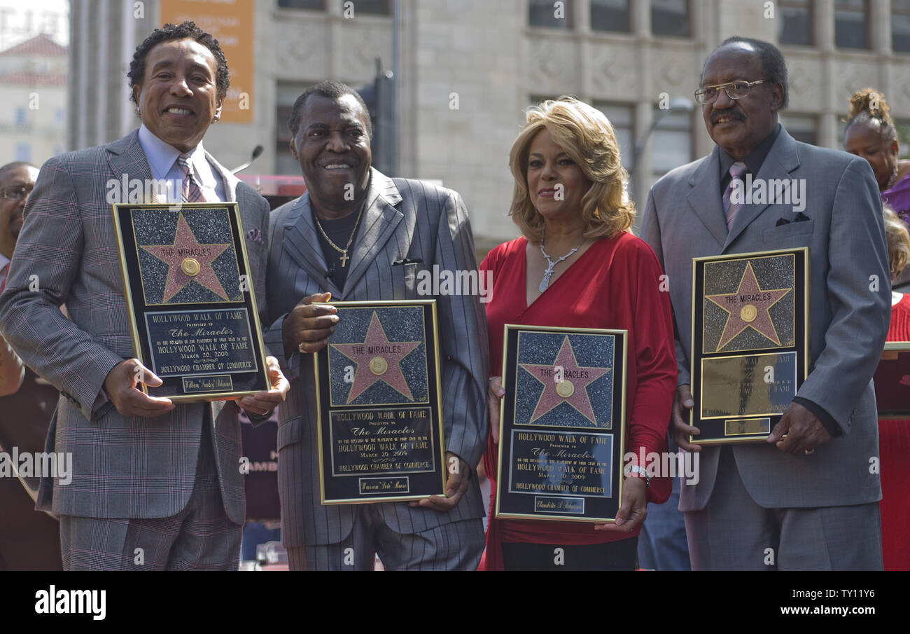 Songwriters and performers from the group 'The Miracles' (L to R) William  'Smokey Robinson',  Warren 'Pete' Moore, Claudette Robinson and Bobby Rogers are honored with a Star on the Hollywood Walk of Fame in Hollywood, California on March 20, 2009.  (UPI Photo/Hector Mata) Stock Photo