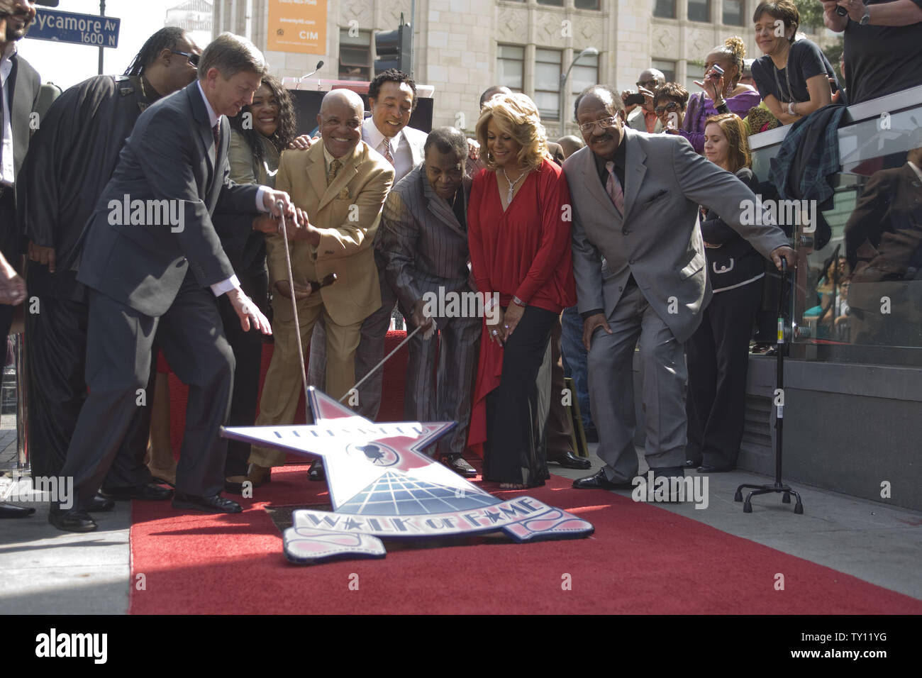 Celebrities and dignitaries (from L to R) Musician and Composer Stevie Wonder,The Hollywood Chamber of Commerce President Leron Gubler, the wife of late Ronnie White, Gloria White, Record Produder Berry Gordy and members of the group 'The Miracles' William 'Smokey Robinson',  Warren 'Pete' Moore, Claudette Robinson and Bobby Rogers unveiled their  Star on the Hollywood Walk of Fame in Hollywood, California on March 20, 2009.  (UPI Photo/Hector Mata) Stock Photo