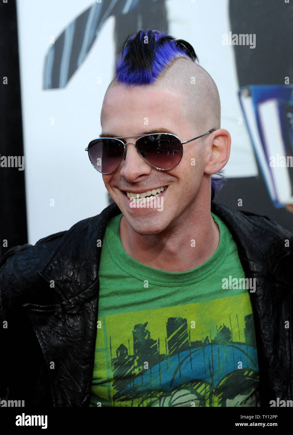 Actor Seth Green sports a mohawk as he attends the premiere of the