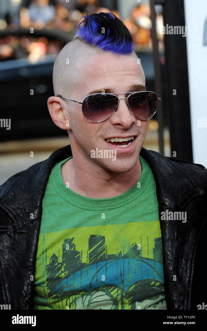 Actor Seth Green sports a mohawk as he attends the premiere of the