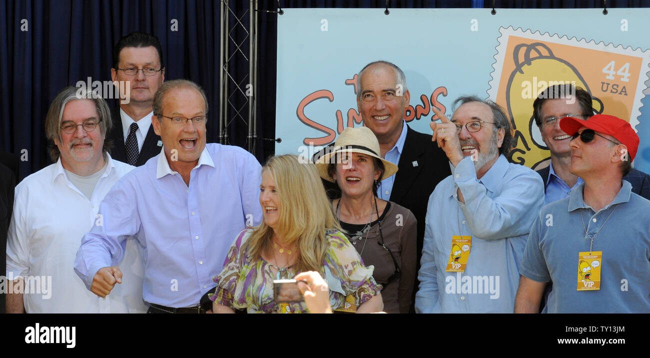 Actor Kelsey Grammer (2nd-L), the voice of Side Show Bob reacts as Creator and Executive Producer Matt Groening, Nancy Cartwright, the voice of Bart Simpson, Julie Kavner, the voice of Marge Simpson, Executive Producer James L. Brooks  and Dan Castellaneta, the voice of Homer Simpson (L-R) look on at the unveiling of the new 'The Simpsons' U.S. postage stamps in Los Angeles May 7, 2009. (UPI Photo/Jim Ruymen) Stock Photo