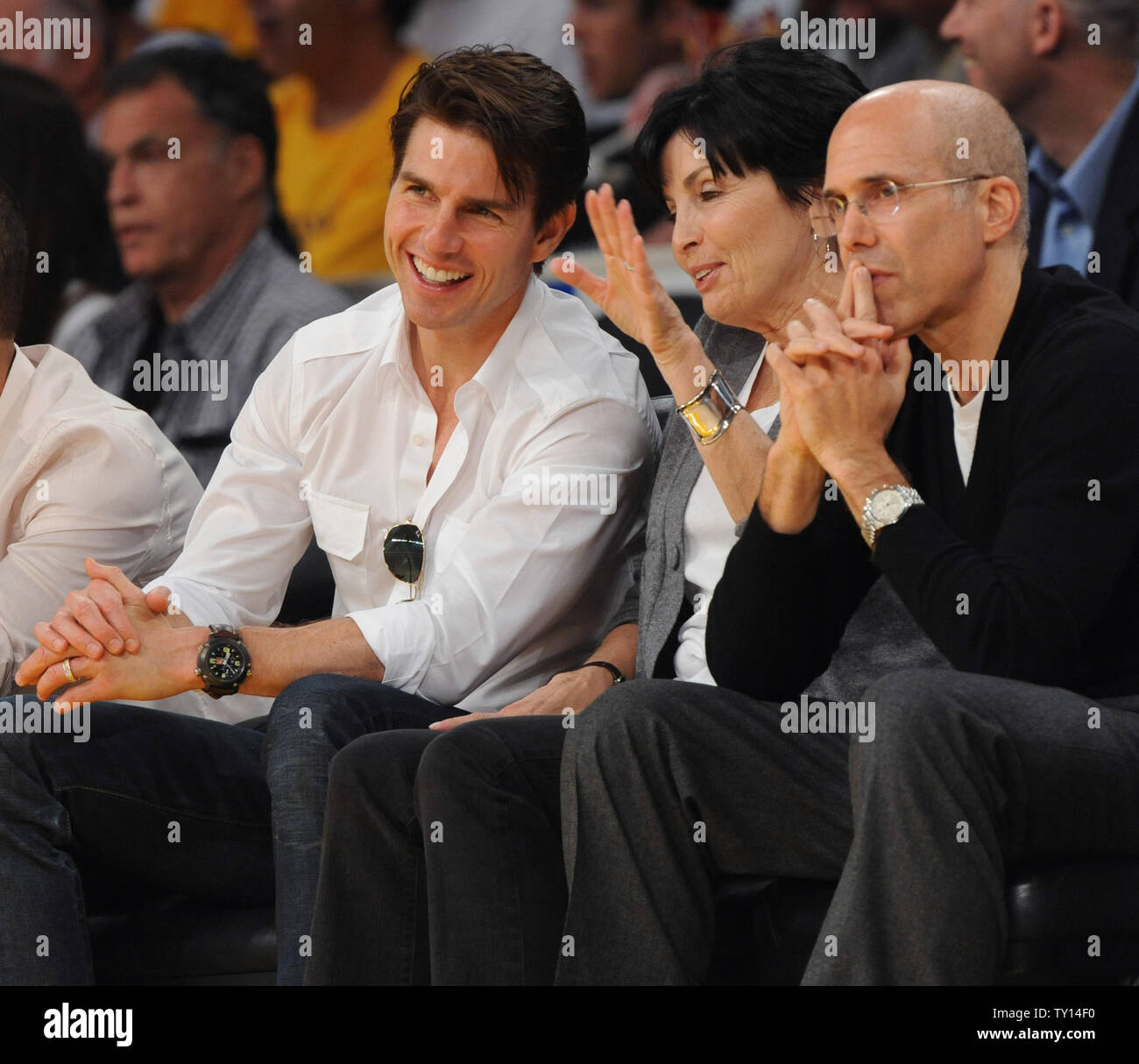Actor Tom Cruise (L) sits courtside as he attends  Game 2 of the Los Angeles Lakers vs Denver Nuggets NBA Western Conference finals with Jeffrey Katzenberg and his wife Marilyn at Staples Center in Los Angeles on May 21, 2009. The Nuggets defeated the Lakers 106-103 to tie the best-of-seven series 1-1. (UPI Photo/Jim Ruymen) Stock Photo
