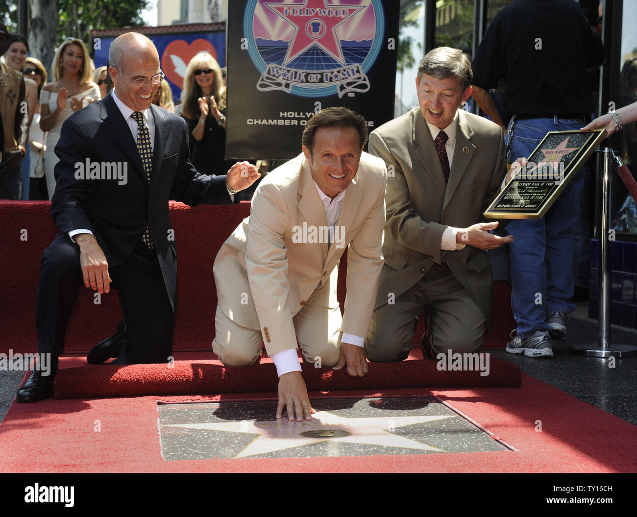 Director of Dreamworks Animation SKG, Jeffrey Katzenberg (L-R), Producer Mark Burnett, and Hollywood Chamber of Commerce President and CEO Leron Gubler participate in a ceremony where Burnett receives a star on the Hollywood Walk of Fame in Los Angeles on July 8, 2009. Burnett has produced reality television series like 'Survivor,' 'The Apprentice,' 'The Contender,' and 'Are You Smarter Than a Fifth Grader.'(UPI Photo/ Phil McCarten) Stock Photo