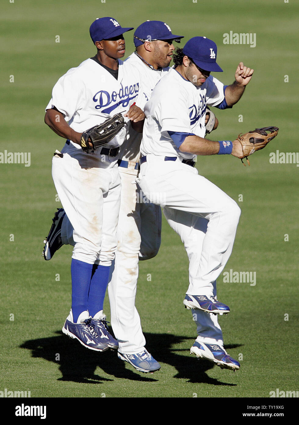 Los Angeles Dodgers , left to right, Juan Pierre, Matt Kemp, and